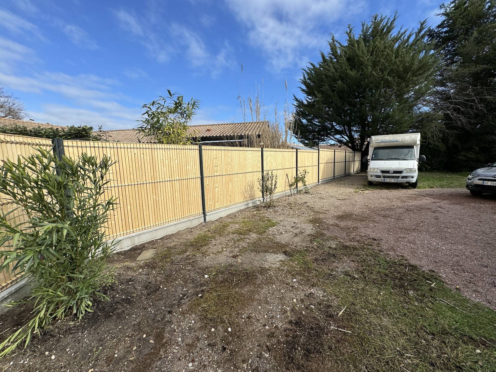 Cloture rigide avec occultation bois à Hourtin !