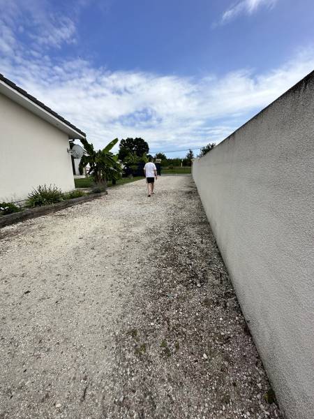 Rénovation d'une aire de stationnement de 180 m2 en gravier garonne  à Lesparre par Bouleris ! 
